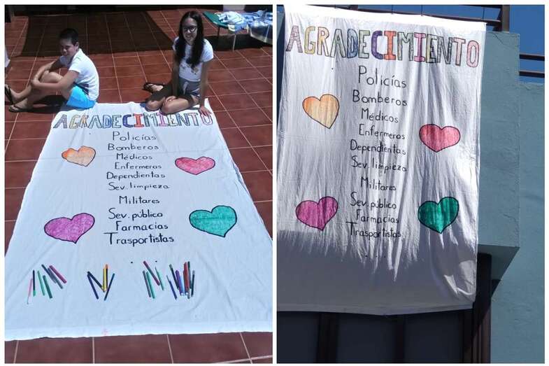 Pancartas confeccionadas por Álvaro y Verónica de apoyo a los servicios públicos que luchan contra la pandemia (Foto TA)